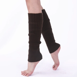 Detail view of thick ribbed knit leg warmers in dark brown for winter boots and outfits