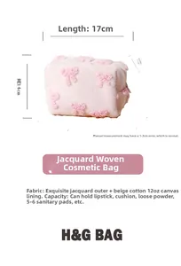 Pink plush cosmetic bag with 3D bow patterns and dimensions showing 17x11x14cm size