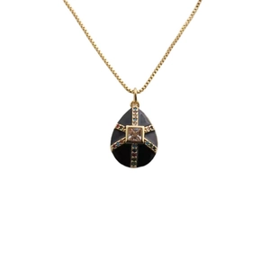 Gold plated copper necklace with black teardrop pendant featuring a colorful cross