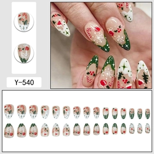 Short oval Christmas press-on nails with snowflakes, Santa hats and candy cane designs