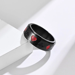 Rotating black stainless steel poker ring featuring heart, spade, club, and diamond suits