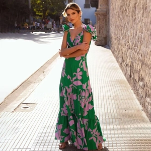 Floral print maxi dress with V-neckline and tiered ruffle layers in emerald and lilac