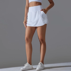 Close-up of white high-waisted tennis skirt side pocket and breathable elastic fabric