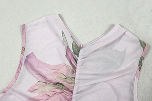 Detail of V-neckline and ruched chest on light pink floral mesh tulle dress