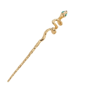 Snake hair pin in gold metal with green eyes and textured design on white background