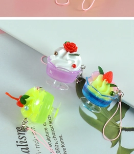 Close-up of three colorful mini simulation fruit sundae cup pendants with creative details