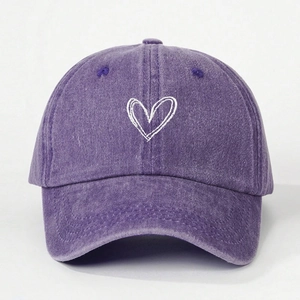 Vintage washed purple baseball cap with white heart embroidery and adjustable strap