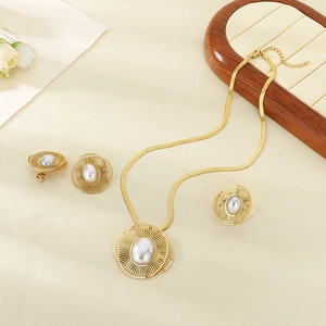 Detailed set of gold-plated hollow jewelry featuring elegant round faux pearls