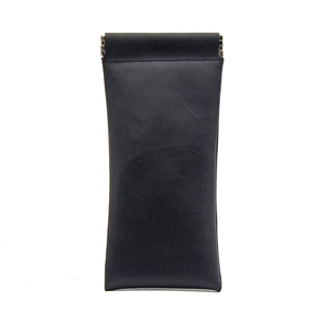 Detailed view of black faux leather pouch with automatic metal spring closure mechanism