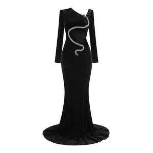 Elegant black velvet mermaid dress with long sleeves and silver snake sequin detail