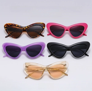 Flat lay of cat-eye sunglasses in five stylish colors with high-quality resin frames