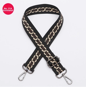 Detail of adjustable bag strap No. 314 with gunmetal hardware and retro chain patterns