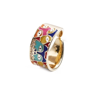 Bague ouverte dorée artistique avec visage en émail coloré et zircons scintillants