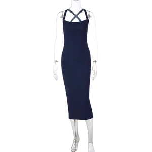 Detailed view of navy bodycon midi dress featuring ribbed knit texture and square neckline