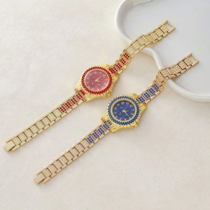Luxury gold women's quartz watch with colorful rhinestones in red and blue crystal styles