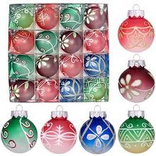 Detail view of colorful 6cm Christmas balls with glitter patterns and matte finish