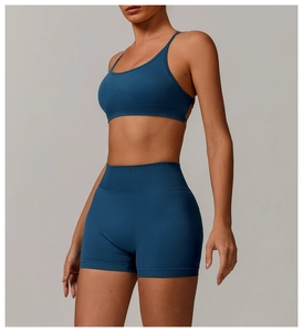 Detail of teal seamless yoga set showing racerback sports bra and high-waist shorts