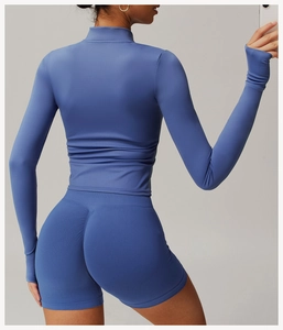 Detail of grey-blue back view showing slim fit yoga top and seamless high waist shorts