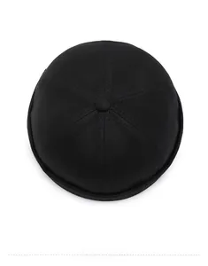Top-down view showing six-panel cotton twill construction of black docker cap
