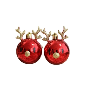 Red reindeer Christmas ball ornaments with gold antlers for holiday tree decoration