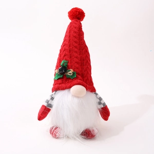 Lighted Christmas gnome doll with red knit hat and white faux fur beard on white background