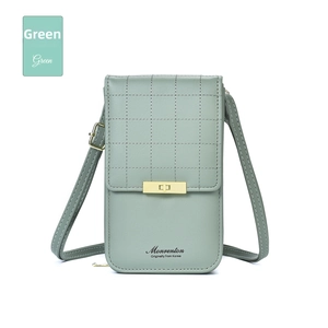 Detail of green quilted leather phone bag featuring a gold square buckle and adjustable strap
