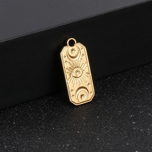 Golden stainless steel rectangular pendant with celestial sun and moon engraving