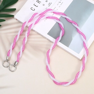 Pink and white braided crossbody phone strap with glitter mesh texture and silver rings