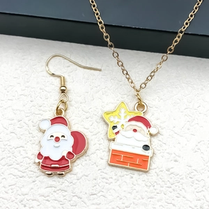 Christmas jewelry set with Santa Claus enamel earrings and gold necklace pendant