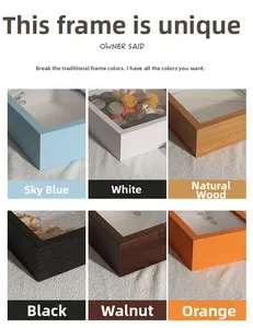 Detail view of 3D shadow box frames in six colors showing wood grain texture