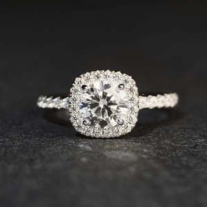 Elegant 1 carat silver halo moissanite ring with princess cut and sparkling pavé band