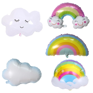 Detailed collection of white clouds and rainbow foil balloons for birthday party decor