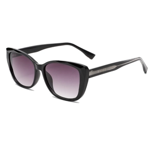 Occhiali da sole cat-eye neri con lenti viola sfumate e decorazioni in metallo argento