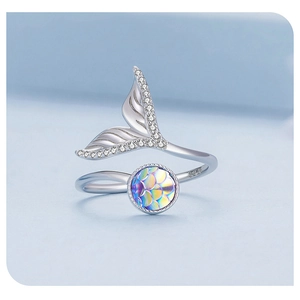 Macro shot of S925 sterling silver ring showing iridescent mermaid tail and scales