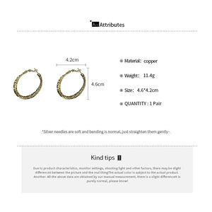 Detailed product dimensions for gold-tone hammered geometric hoop earrings in brass