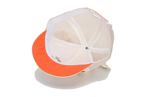 Detailed inner view of a breathable mesh baby baseball cap with a short orange brim