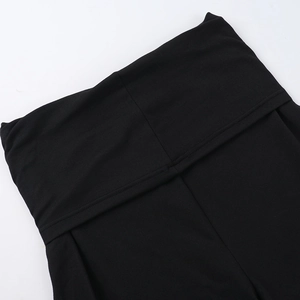 Detail shot of black V-neck lace stitching and high-quality knit fabric texture