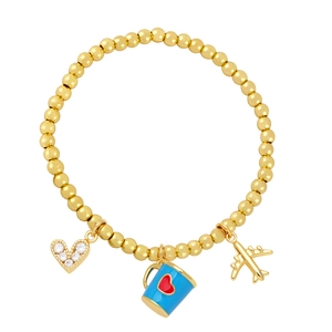 Detail of beaded bracelet with gold airplane, blue coffee cup and zircon heart charms