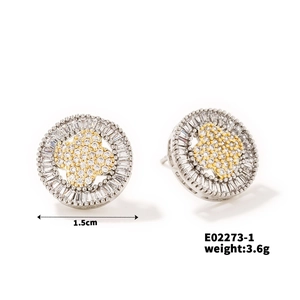 Detail view of 1.5cm geometric stud earrings with inlaid zircon and gold clover center