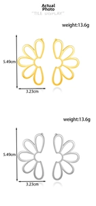 Detail view of large hollow flower earrings in gold and silver showing 5.49cm height dimension