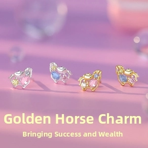 Macro shot of 925 silver horse earrings featuring colorful zircons on purple background