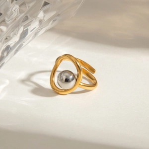 Two-tone stainless steel open ring with gold oval frame and silver sphere bead