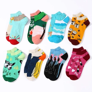 8-pack cotton crew socks with colorful patterns like pandas and camping on white background
