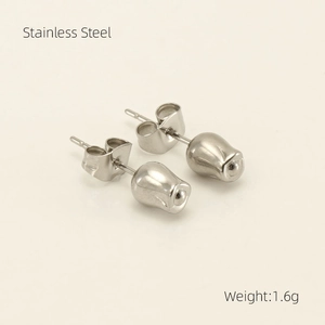 Detail showing 1.6g silver stainless steel rose bud stud earrings with back closure