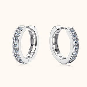 Detail of S925 sterling silver hoop earrings with shimmering moissanite stones