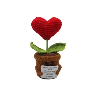 Handmade crochet emotional support plant with red heart and encouraging message card