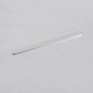 Close-up of polished silver stainless steel rectangle strip for DIY bracelet jewelry making