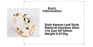 Detail of 316 stainless steel gold leaf bracelet with black enamel and rhinestones