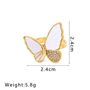 Detail view of gold butterfly ring with shell inlay and rhinestones, 2.4cm x 2.4cm size