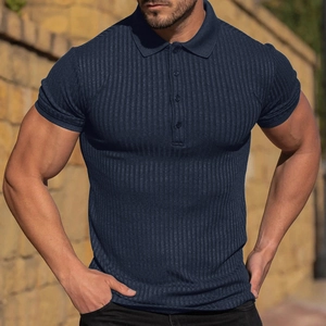 Detail of navy blue slim fit polo shirt with vertical ribbed texture and three-button placket
